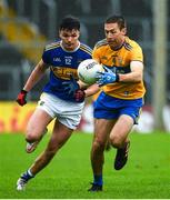 1 November 2020; Gary Brennan of Clare in action against Conal Kennedy of Tipperary during the Munster GAA Football Senior Championship Quarter-Final match between Tipperary and Clare at Semple Stadium in Thurles, Tipperary. Photo by Diarmuid Greene/Sportsfile