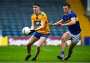 1 November 2020; Joe McGann of Clare in action against Alan Campbell of Tipperary during the Munster GAA Football Senior Championship Quarter-Final match between Tipperary and Clare at Semple Stadium in Thurles, Tipperary. Photo by Diarmuid Greene/Sportsfile