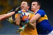 1 November 2020; David Tubridy of Clare in action against Alan Campbell of Tipperary during the Munster GAA Football Senior Championship Quarter-Final match between Tipperary and Clare at Semple Stadium in Thurles, Tipperary. Photo by Diarmuid Greene/Sportsfile