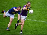 1 November 2020; Mark Rossiter of Wexford in action against Rory Finn of Wicklow during the Leinster GAA Football Senior Championship Round 1 match between Wexford and Wicklow at Chadwicks Wexford Park in Wexford. Photo by Piaras Ó Mídheach/Sportsfile