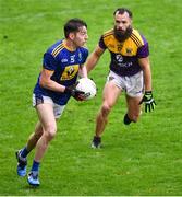 1 November 2020; Conor Byrne of Wicklow in action against Conor Carty of Wexford during the Leinster GAA Football Senior Championship Round 1 match between Wexford and Wicklow at Chadwicks Wexford Park in Wexford. Photo by Piaras Ó Mídheach/Sportsfile
