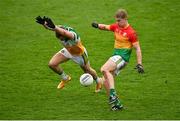 1 November 2020; Ross Dunphy of Carlow in action against Anton Sullivan of Offaly during the Leinster GAA Football Senior Championship Round 1 match between Offaly and Carlow at Bord na Mona O'Connor Park in Tullamore, Offaly. Photo by Seb Daly/Sportsfile