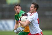 1 November 2020; Kieran McGeary of Tyrone in action against Ciaran Thompson of Donegal during the Ulster GAA Football Senior Championship Quarter-Final match between Donegal and Tyrone at MacCumhaill Park in Ballybofey, Donegal. Photo by Stephen McCarthy/Sportsfile
