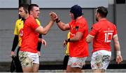 1 November 2020; Matt Gallagher of Munster, left, celebrates with team-mates after scoring a try during the Guinness PRO14 match between Dragons and Munster at Rodney Parade in Newport, Wales. Photo by Ben Evans/Sportsfile