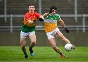 1 November 2020; Bernard Allen of Offaly shoots to score his side's third goal, despite pressure from Mikey Bambrick of Carlow, during the Leinster GAA Football Senior Championship Round 1 match between Offaly and Carlow at Bord na Mona O'Connor Park in Tullamore, Offaly. Photo by Seb Daly/Sportsfile