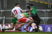 1 November 2020; Conor McKenna of Tyrone has a shot on goal despite the attention of Stephen McMenamin and Shaun Patton of Donegal during the Ulster GAA Football Senior Championship Quarter-Final match between Donegal and Tyrone at Pairc MacCumhaill in Ballybofey, Donegal. Photo by Harry Murphy/Sportsfile