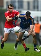 1 November 2020; Kevin Diffley of Longford is tackled by Eoghan Callaghan of Louth during the Leinster GAA Football Senior Championship Round 1 match between Louth and Longford at TEG Cusack Park in Mullingar, Westmeath. Photo by Eóin Noonan/Sportsfile