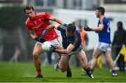 1 November 2020; Kevin Diffley of Longford is tackled by Eoghan Callaghan of Louth during the Leinster GAA Football Senior Championship Round 1 match between Louth and Longford at TEG Cusack Park in Mullingar, Westmeath. Photo by Eóin Noonan/Sportsfile