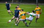 1 November 2020; Cillian O'Connor of Mayo shoots to score his side's second goal past Leitrim goalkeeper Brendan Flynn and Conor Reynolds, 4, during the Connacht GAA Football Senior Championship Quarter-Final match between Leitrim and Mayo at Avantcard Páirc Sean Mac Diarmada in Carrick-on-Shannon, Leitrim. Photo by Ramsey Cardy/Sportsfile