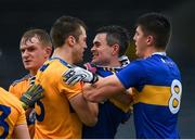 1 November 2020; Cillian Brennan of Clare and Michael Quinlivan of Tipperary tussle off the ball at half time of the Munster GAA Football Senior Championship Quarter-Final match between Tipperary and Clare at Semple Stadium in Thurles, Tipperary. Photo by Diarmuid Greene/Sportsfile