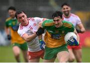 1 November 2020; Michael Langan of Donegal in action against Darragh Canavan of Tyrone during the Ulster GAA Football Senior Championship Quarter-Final match between Donegal and Tyrone at MacCumhaill Park in Ballybofey, Donegal. Photo by Stephen McCarthy/Sportsfile
