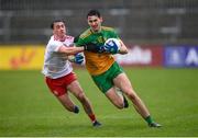 1 November 2020; Michael Langan of Donegal in action against Darragh Canavan of Tyrone during the Ulster GAA Football Senior Championship Quarter-Final match between Donegal and Tyrone at MacCumhaill Park in Ballybofey, Donegal. Photo by Stephen McCarthy/Sportsfile