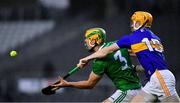 1 November 2020; Dan Morrissey of Limerick in action against Jake Morris of Tipperary during the Munster GAA Hurling Senior Championship Semi-Final match between Tipperary and Limerick at Páirc Uí Chaoimh in Cork. Photo by Ray McManus/Sportsfile