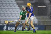 1 November 2020; Jake Morris of Tipperary scores his side's first goal despite the challenge of Sean Finn of Limerick during the Munster GAA Hurling Senior Championship Semi-Final match between Tipperary and Limerick at Páirc Uí Chaoimh in Cork. Photo by Daire Brennan/Sportsfile