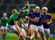 1 November 2020; Noel McGrath of Tipperary is tackled by Gearoid Hegarty of Limerick during the Munster GAA Hurling Senior Championship Semi-Final match between Tipperary and Limerick at Páirc Uí Chaoimh in Cork. Photo by Brendan Moran/Sportsfile