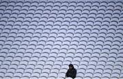 1 November 2020; Photographer George Hatchell watches on, at the other end, during the Munster GAA Hurling Senior Championship Semi-Final match between Tipperary and Limerick at Páirc Uí Chaoimh in Cork. Photo by Ray McManus/Sportsfile