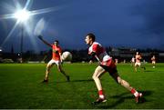 1 November 2020; (EDITOR'S NOTE: This image was created using a starburst filter) Paul McNeill of Derry in action against Paddy Burns of Armagh during the Ulster GAA Football Senior Championship Quarter-Final match between Derry and Armagh at Celtic Park in Derry. Photo by David Fitzgerald/Sportsfile