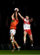1 November 2020; Niall Grimley of Armagh in action against Emmett Bradley of Derry the Ulster GAA Football Senior Championship Quarter-Final match between Derry and Armagh at Celtic Park in Derry. Photo by David Fitzgerald/Sportsfile