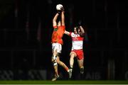 1 November 2020; Niall Grimley of Armagh in action against Emmett Bradley of Derry the Ulster GAA Football Senior Championship Quarter-Final match between Derry and Armagh at Celtic Park in Derry. Photo by David Fitzgerald/Sportsfile