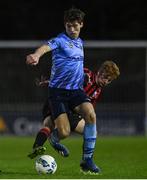 31 October 2020; Dara Keane of UCD in action against Aaron McCabe of Longford Town during the SSE Airtricity League First Division Play-off Semi-Final match between UCD and Longford Town at the UCD Bowl in Belfield, Dublin. Photo by Sam Barnes/Sportsfile