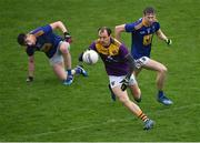 1 November 2020; Kevin O'Grady of Wexford in action against Eoin Darcy, left, and Andy Maher of Wicklow during the Leinster GAA Football Senior Championship Round 1 match between Wexford and Wicklow at Chadwicks Wexford Park in Wexford. Photo by Piaras Ó Mídheach/Sportsfile