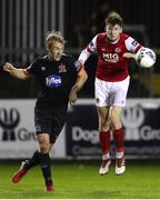 1 November 2020; Rory Feely of St Patrick's Athletic in action against Greg Sloggett of Dundalk during the SSE Airtricity League Premier Division match between St. Patrick's Athletic and Dundalk at Richmond Park in Dublin. Photo by Michael P Ryan/Sportsfile