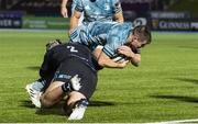 2 November 2020: Luke McGrath of Leinster scores his side's second try despite the attempts of Grant Stewart of Glasgow Warriors during the Guinness PRO14 match between Glasgow Warriors and Leinster at Scotstoun Stadium in Glasgow, Scotland. Photo by Ross Parker/Sportsfile