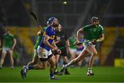 1 November 2020; John McGrath of Tipperary in action against Graeme Mulcahy of Limerick during the Munster GAA Hurling Senior Championship Semi-Final match between Tipperary and Limerick at Páirc Uí Chaoimh in Cork. Photo by Brendan Moran/Sportsfile