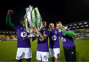 4 November 2020; Shamrock Rovers players, from left, Thomas Oluwa, Dean Williams, Max Murphy and Brandon Kavanagh celebrate after being presented with the SSE Airtricity League Premier Division trophy following their match against St Patrick's Athletic at Tallaght Stadium in Dublin. Photo by Stephen McCarthy/Sportsfile