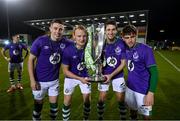 4 November 2020; Shamrock Rovers players, from left, Gary O'Neill, Liam Scales, Neil Farrugia and Dylan Watts celebrate after being presented with the SSE Airtricity League Premier Division trophy following their match against St Patrick's Athletic at Tallaght Stadium in Dublin. Photo by Stephen McCarthy/Sportsfile