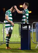 4 November 2020; Aaron Greene is presented with his league winners medal by Shamrock Rovers captain Ronan Finn following the SSE Airtricity League Premier Division match between Shamrock Rovers and St Patrick's Athletic at Tallaght Stadium in Dublin. Photo by Stephen McCarthy/Sportsfile