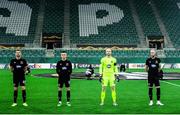 5 November 2020; Dundalk players, from left, Andy Boyle, Darragh Leahy, Aaron McCarey and Chris Shields prior to the UEFA Europa League Group B match between SK Rapid Wien and Dundalk at Allianz Stadion in Vienna, Austria. Photo by Vid Ponikvar/Sportsfile