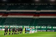 5 November 2020; Both teams stand for the national anthems prior to the UEFA Europa League Group B match between SK Rapid Wien and Dundalk at Allianz Stadion in Vienna, Austria. Photo by Vid Ponikvar/Sportsfile