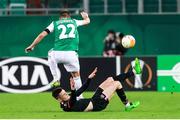 5 November 2020; Darragh Leahy of Dundalk tackles Filip Stojkovic of SK Rapid Wien during the UEFA Europa League Group B match between SK Rapid Wien and Dundalk at Allianz Stadion in Vienna, Austria. Photo by Vid Ponikvar/Sportsfile