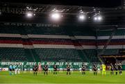 5 November 2020; Both teams stand for a minute's silence for the victims of the Vienna terrorist attack during the UEFA Europa League Group B match between SK Rapid Wien and Dundalk at Allianz Stadion in Vienna, Austria. Photo by Vid Ponikvar/Sportsfile