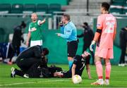5 November 2020; Michael Duffy of Dundalk receives medical attention during the UEFA Europa League Group B match between SK Rapid Wien and Dundalk at Allianz Stadion in Vienna, Austria. Photo by Vid Ponikvar/Sportsfile