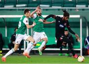 5 November 2020; Nathan Oduwa of Dundalk in action against Filip Stojkovic, centre, and Dejan Ljubicic of SK Rapid Wien during the UEFA Europa League Group B match between SK Rapid Wien and Dundalk at Allianz Stadion in Vienna, Austria. Photo by Vid Ponikvar/Sportsfile