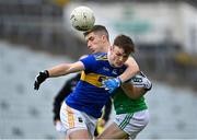 7 November 2020; Emmet Moloney of Tipperary in action against Seán McSweeney of Limerick during the Munster GAA Football Senior Championship Semi-Final match between Limerick and Tipperary at LIT Gaelic Grounds in Limerick. Photo by Piaras Ó Mídheach/Sportsfile