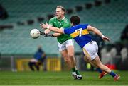 7 November 2020; Adrian Enright of Limerick in action against Robbie Kiely of Tipperary during the Munster GAA Football Senior Championship Semi-Final match between Limerick and Tipperary at LIT Gaelic Grounds in Limerick. Photo by Piaras Ó Mídheach/Sportsfile