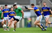 7 November 2020; Tommie Childs of Limerick in action against Liam Casey, and Michael Quinlivan, right, of Tipperary during the Munster GAA Football Senior Championship Semi-Final match between Limerick and Tipperary at LIT Gaelic Grounds in Limerick. Photo by Piaras Ó Mídheach/Sportsfile