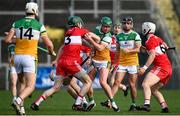 7 November 2020; Eoghan Cahill of Offaly in action against Brian McGilligan of Derry during the Christy Ring Cup Round 2B match between Derry and Offaly at Páirc Esler in Newry, Down. Photo by Sam Barnes/Sportsfile