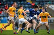 7 November 2020; Thomas Galligan of Cavan is tackled by Paddy McCormack of Antrim during the Ulster GAA Football Senior Championship Quarter-Final match between Cavan and Antrim at Kingspan Breffni in Cavan. Photo by Ramsey Cardy/Sportsfile