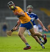 7 November 2020; Colin Guilfoyle of Clare in action against Willie Dunphy of Laois during the GAA Hurling All-Ireland Senior Championship Qualifier Round 1 match between Clare and Laois at UPMC Nowlan Park in Kilkenny. Photo by Brendan Moran/Sportsfile