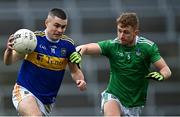7 November 2020; Michael Quinlivan of Tipperary in action against Tony McCarthy of Limerick during the Munster GAA Football Senior Championship Semi-Final match between Limerick and Tipperary at LIT Gaelic Grounds in Limerick. Photo by Piaras Ó Mídheach/Sportsfile