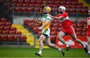 7 November 2020; Shane Kinsella of Offaly in action against Mark Craig of Derry during the Christy Ring Cup Round 2B match between Derry and Offaly at Páirc Esler in Newry, Down. Photo by Sam Barnes/Sportsfile