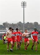 7 November 2020; Derry players leave the field dejected following their sides defeat in the Christy Ring Cup Round 2B match between Derry and Offaly at Páirc Esler in Newry, Down. Photo by Sam Barnes/Sportsfile
