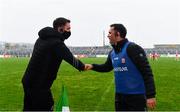 7 November 2020; Offaly manager Michael Fennelly, left, and Derry manager Johnny McEvoy bump fists following the Christy Ring Cup Round 2B match between Derry and Offaly at Páirc Esler in Newry, Down. Photo by Sam Barnes/Sportsfile