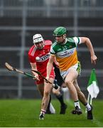 7 November 2020; Brian Duignan of Offaly in action against Conor Kelly of Derry during the Christy Ring Cup Round 2B match between Derry and Offaly at Páirc Esler in Newry, Down. Photo by Sam Barnes/Sportsfile