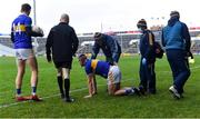 7 November 2020; Michael Quinlivan of Tipperary injured on the sideline in injury-time of the second half during the Munster GAA Football Senior Championship Semi-Final match between Limerick and Tipperary at LIT Gaelic Grounds in Limerick. Photo by Piaras Ó Mídheach/Sportsfile