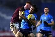 7 November 2020; David Byrne of Dublin is tackled by Lorcan Dolan of Westmeath during the Leinster GAA Football Senior Championship Quarter-Final match between Dublin and Westmeath at MW Hire O'Moore Park in Portlaoise, Laois. Photo by Harry Murphy/Sportsfile